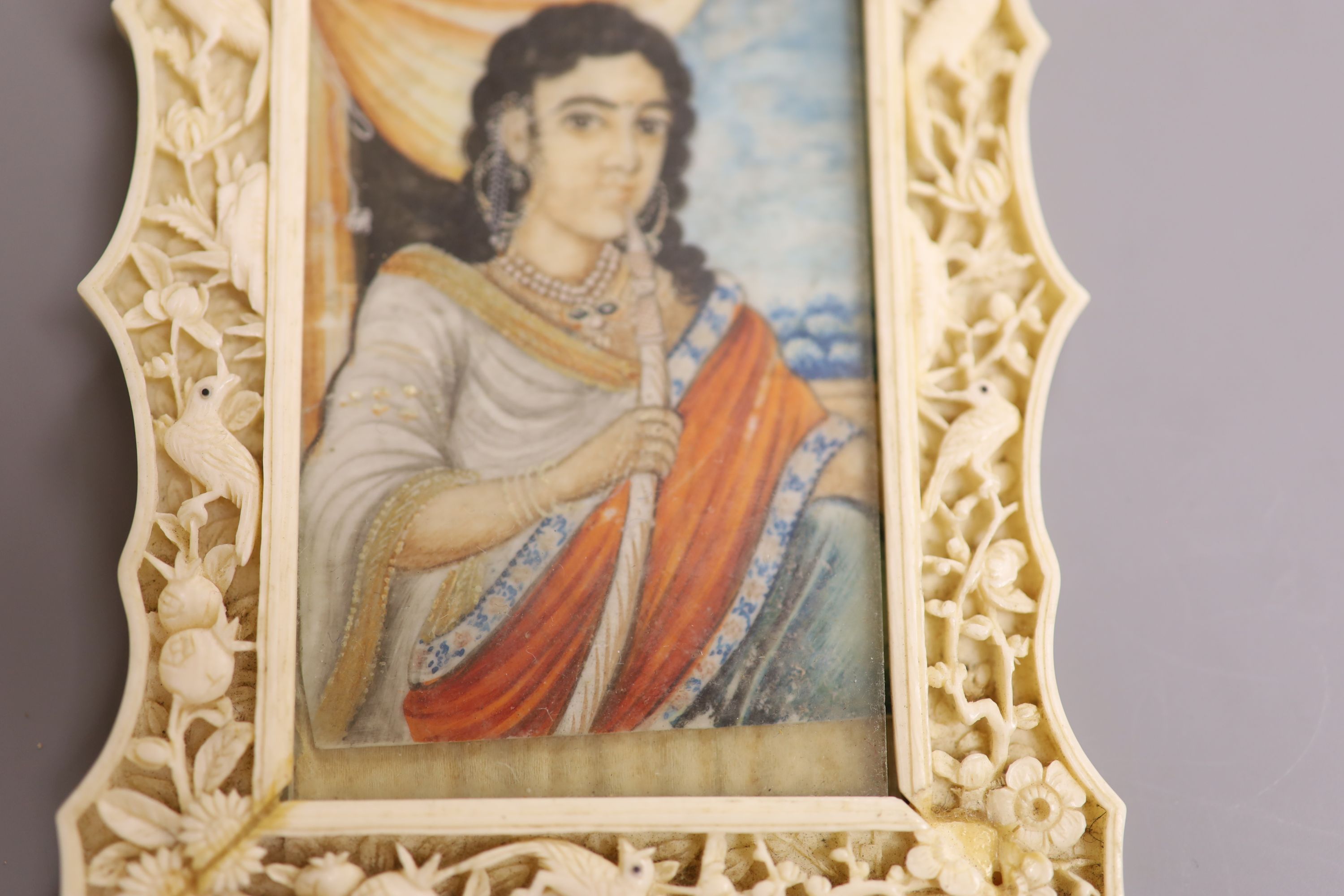 An Indian miniature gouache on ivory in a Chinese Ivory frame, circa 1900 8 x 5.5cm